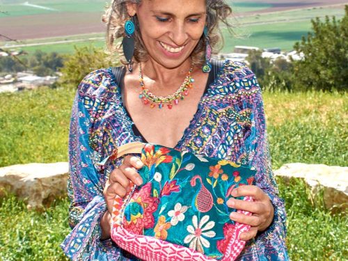 תיק איפור טורקיז כהה פרחוני